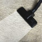 Close-up,View,Of,Cleaning,White,Carpet,With,Professional,Vacuum,Cleaner
