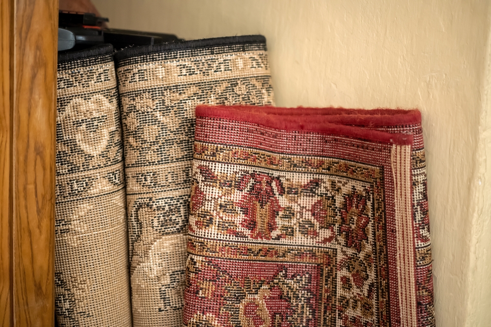 Old,unused,decorative,carpets,stored,away,,home,carpet,storage,,garage